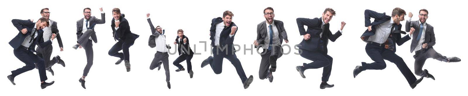 in full growth. two cheerful dancing business people. isolated on white background.