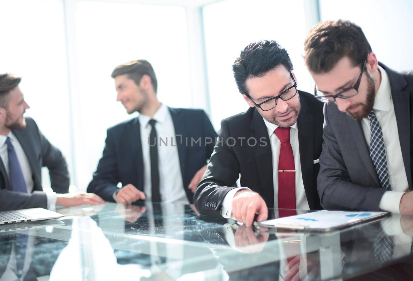 business colleagues discussing financial documents.business concept