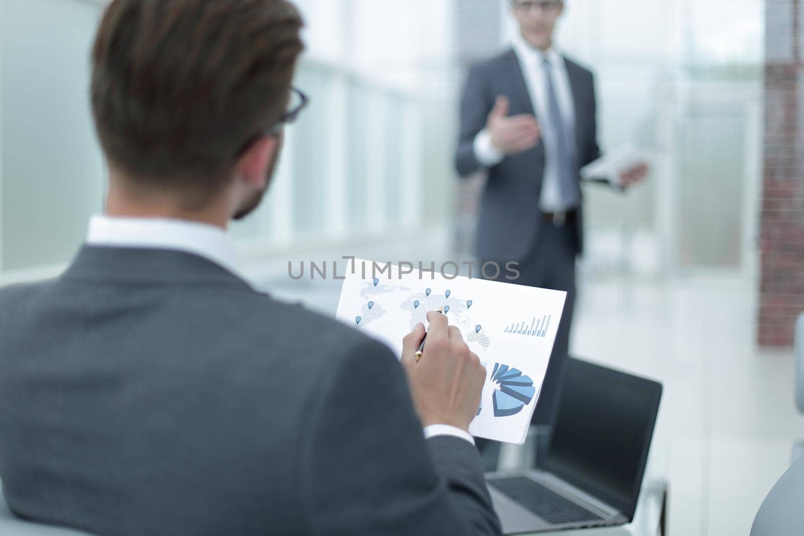 close up.businessman discussing financial report. photo with copy space