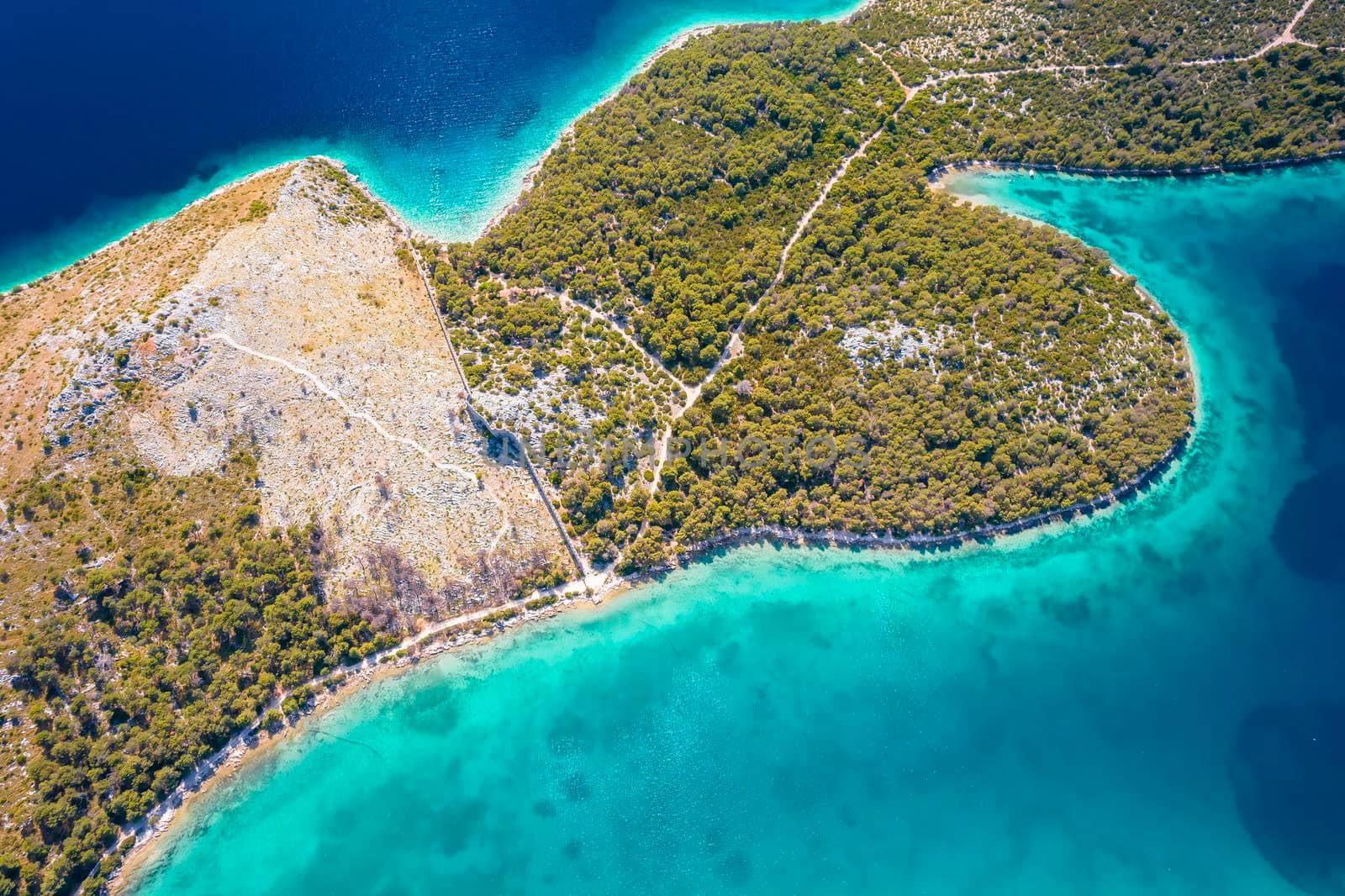 Grebastica turquoise bay and Ostrica historic defence wall ruins aerial view, Dalmatia archipelago of Croatia