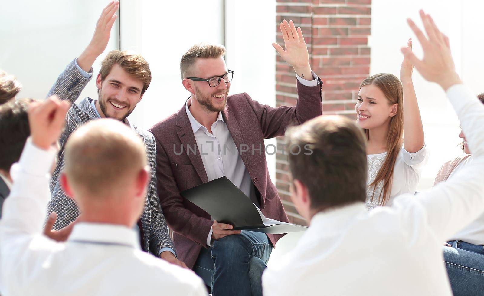 corporate team votes during a business meeting. business concept