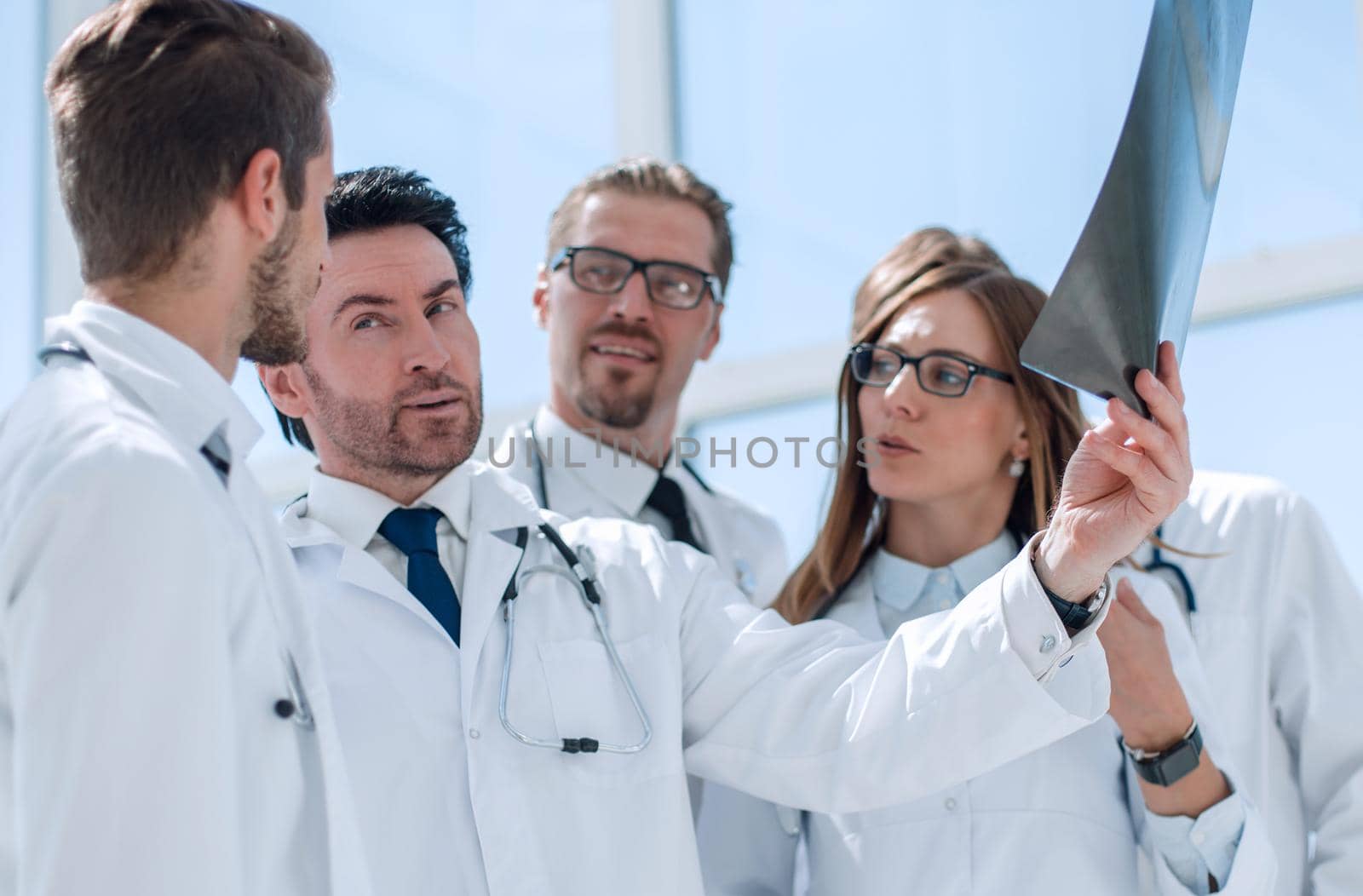 group of doctors discussing the x-ray. the concept of teamwork