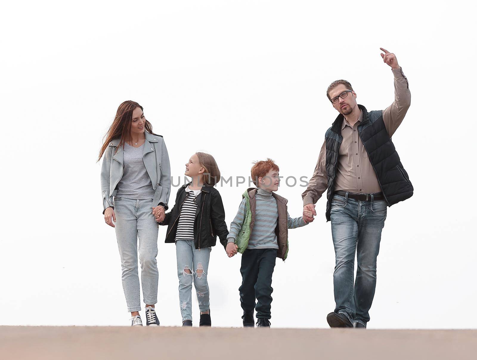 happy family walking, holding each other's hands.photo with copy space