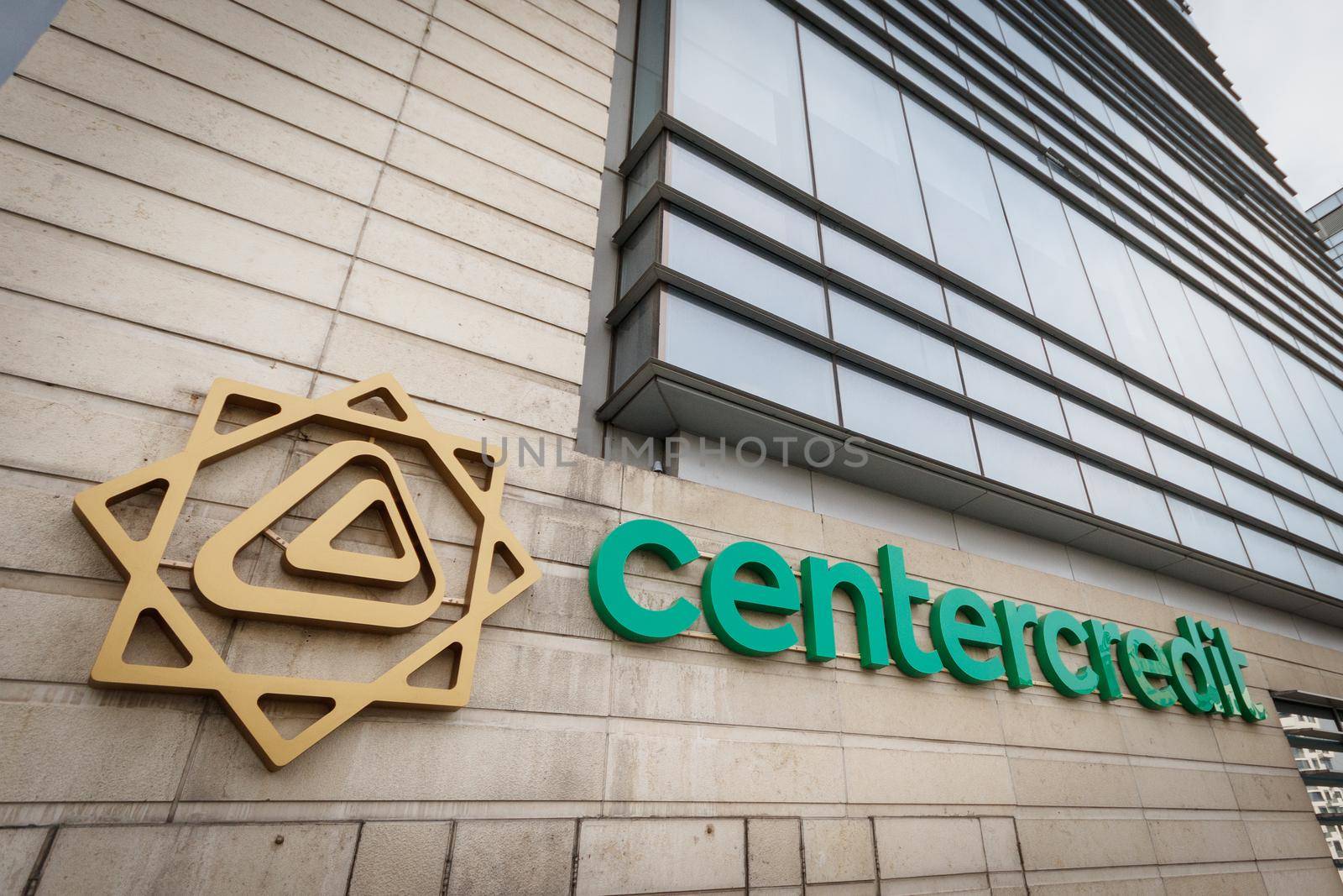 The logo of the Kazakhstan Bank CenterCredit on the Almaty building of the BCC. Almaty, Kazakhstan - September 20, 2021