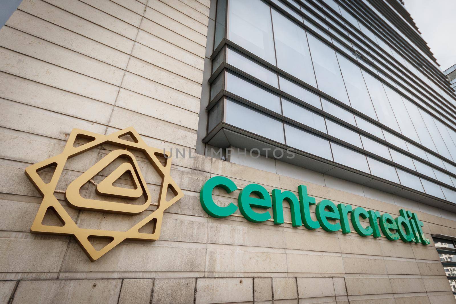 The logo of the Kazakhstan Bank CenterCredit on the Almaty building of the BCC. Almaty, Kazakhstan - September 20, 2021