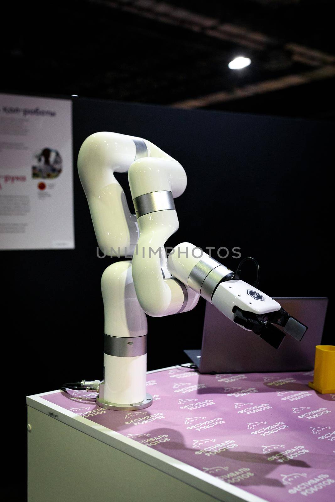 Robot bartender at the exhibition stand at the robot festival. Almaty, Kazakhstan - February 19, 2022