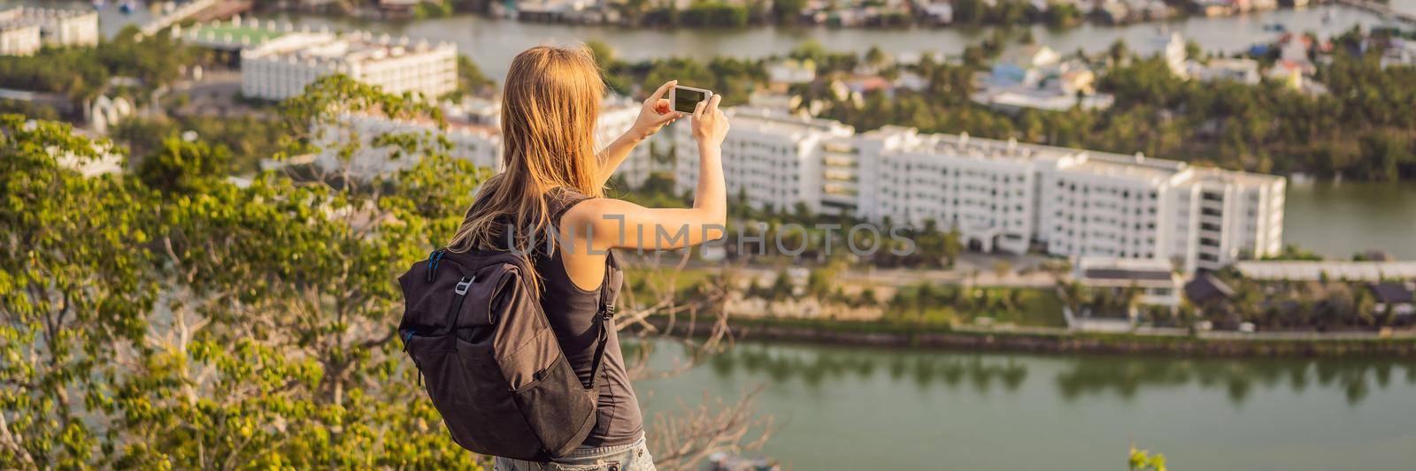 Woman tourist on the background of Nha Trang city. Travel to Vietnam Concept BANNER, LONG FORMAT by galitskaya