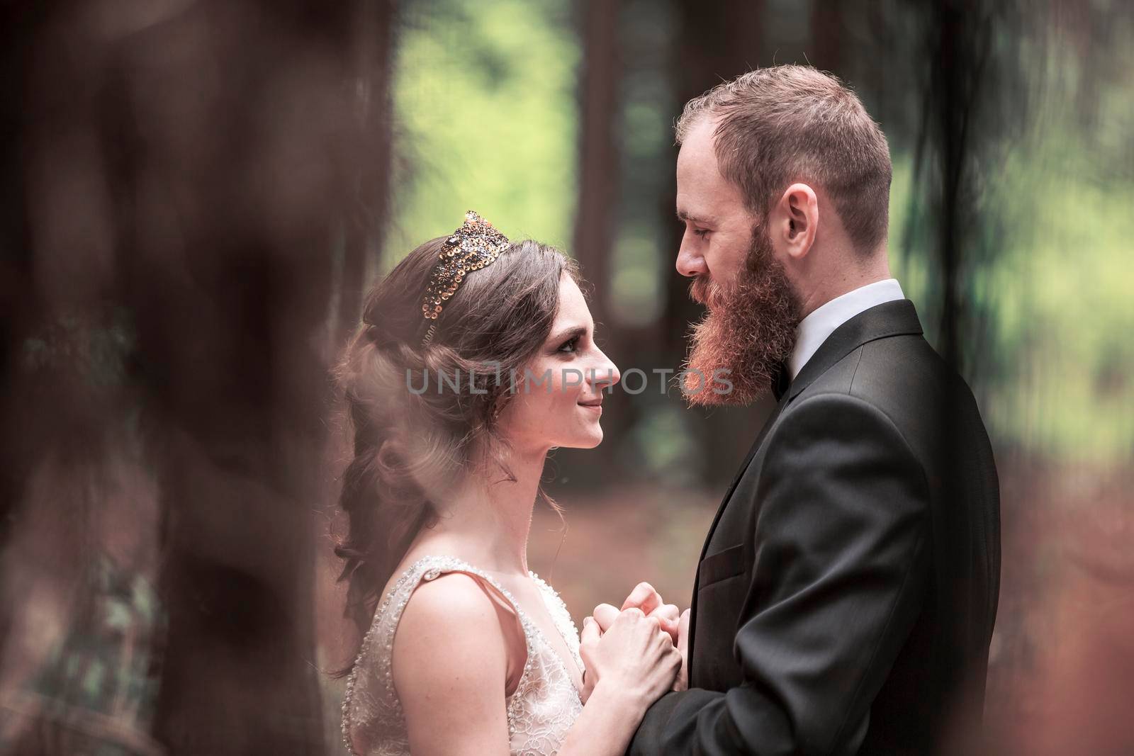 portrait of the bride and groom on the background of the Park by SmartPhotoLab