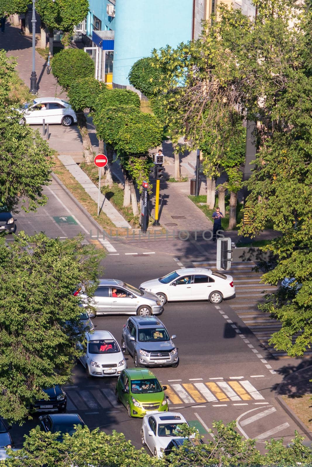 Aerial view of a road intersection in downtown Almaty. Almaty, Kazakhstan - July, 02, 2021