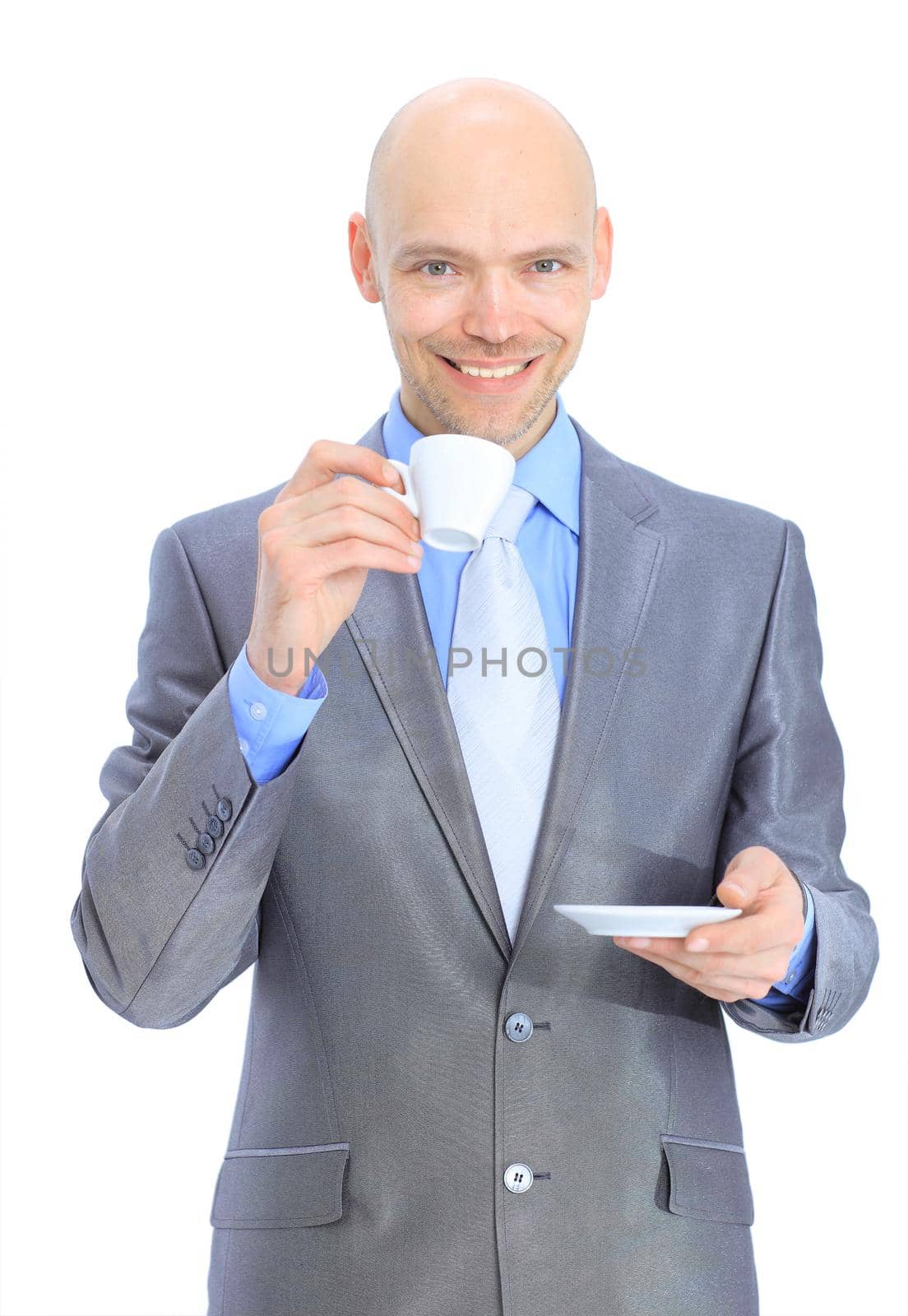 Businessman, drinking coffee. Isolated on a white background.