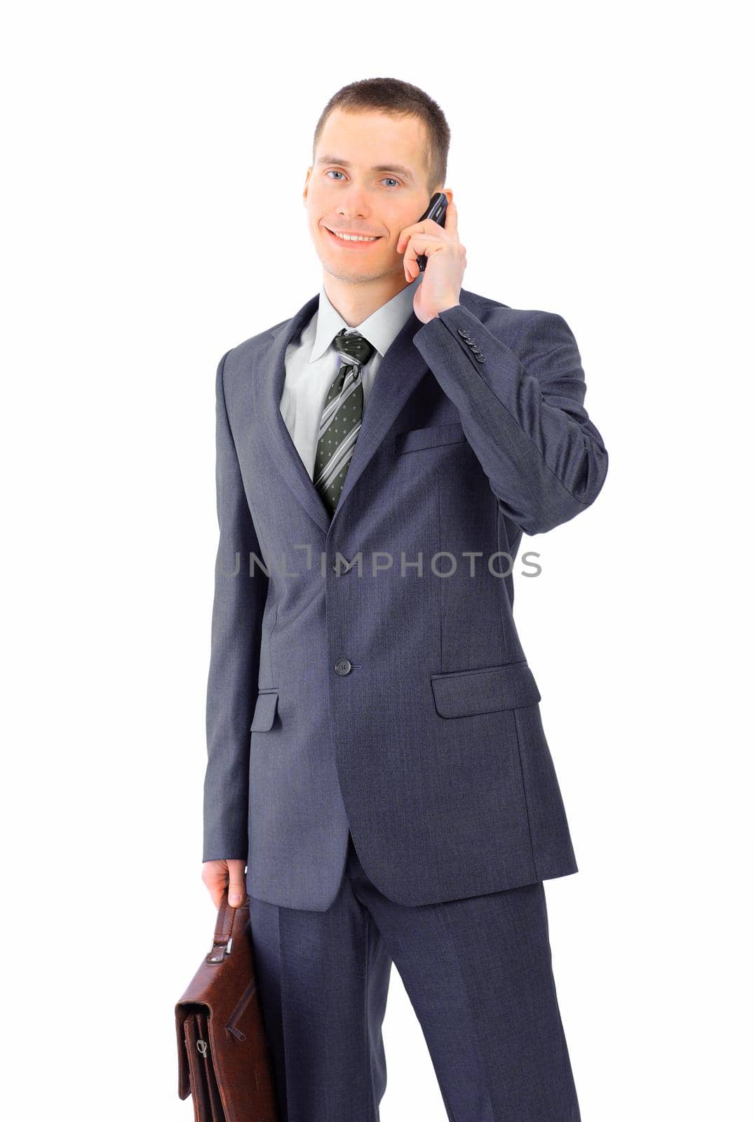 The young businessman. Isolated on a white background.