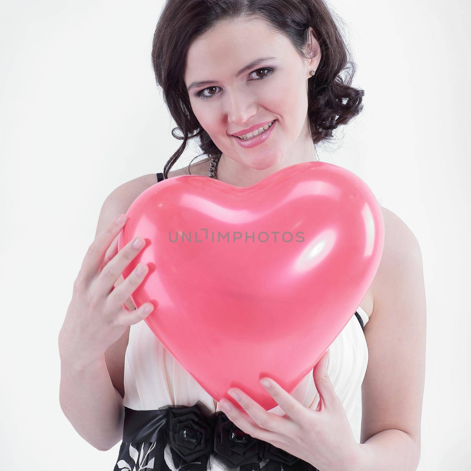 beautiful young woman holding red balloon heart. by SmartPhotoLab