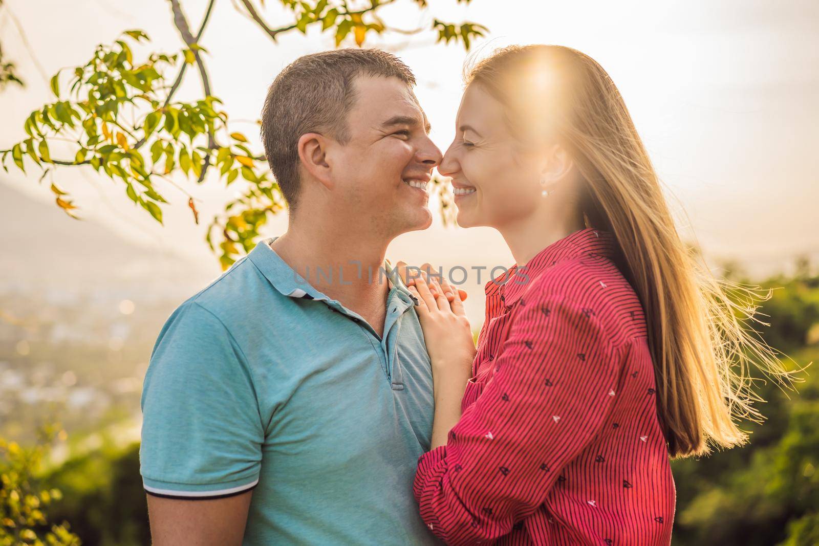 Happy couple tourists on the background of Nha Trang city. Travel to Vietnam Concept.