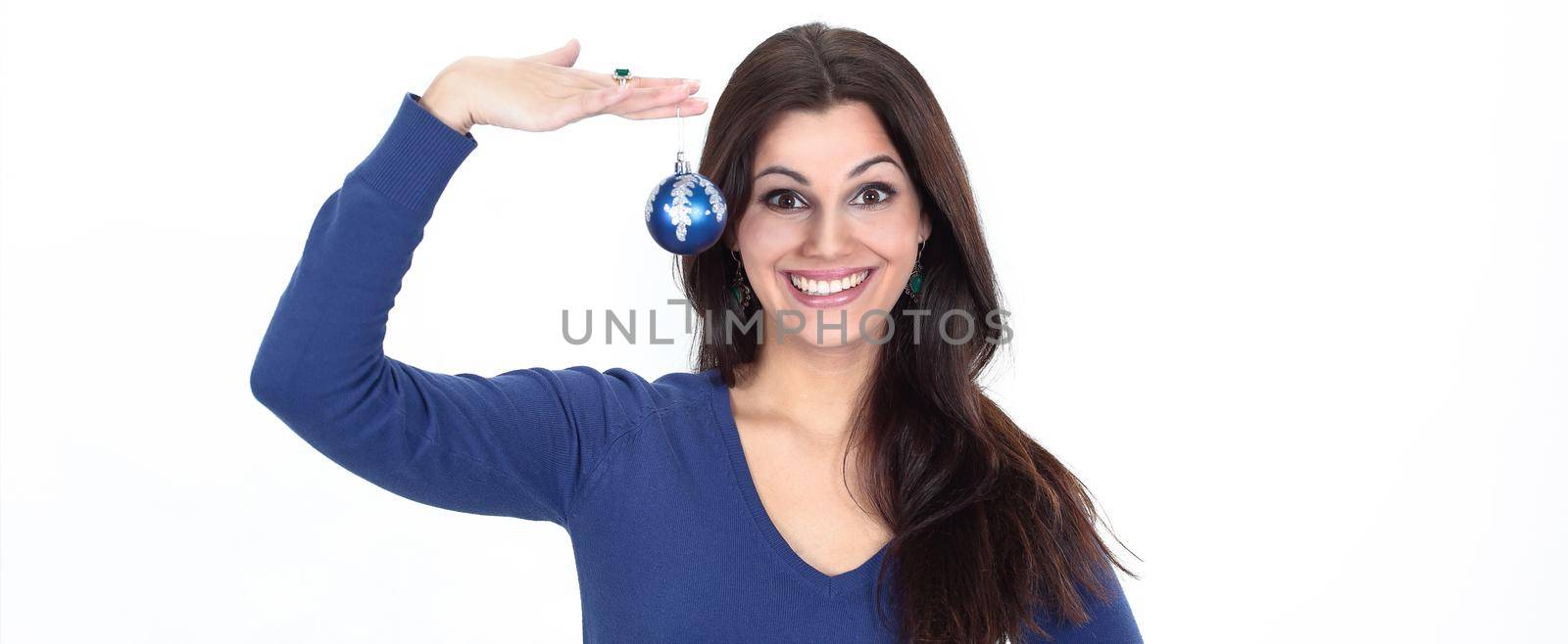 beautiful young woman holding a blue Christmas ball.isolated on white background