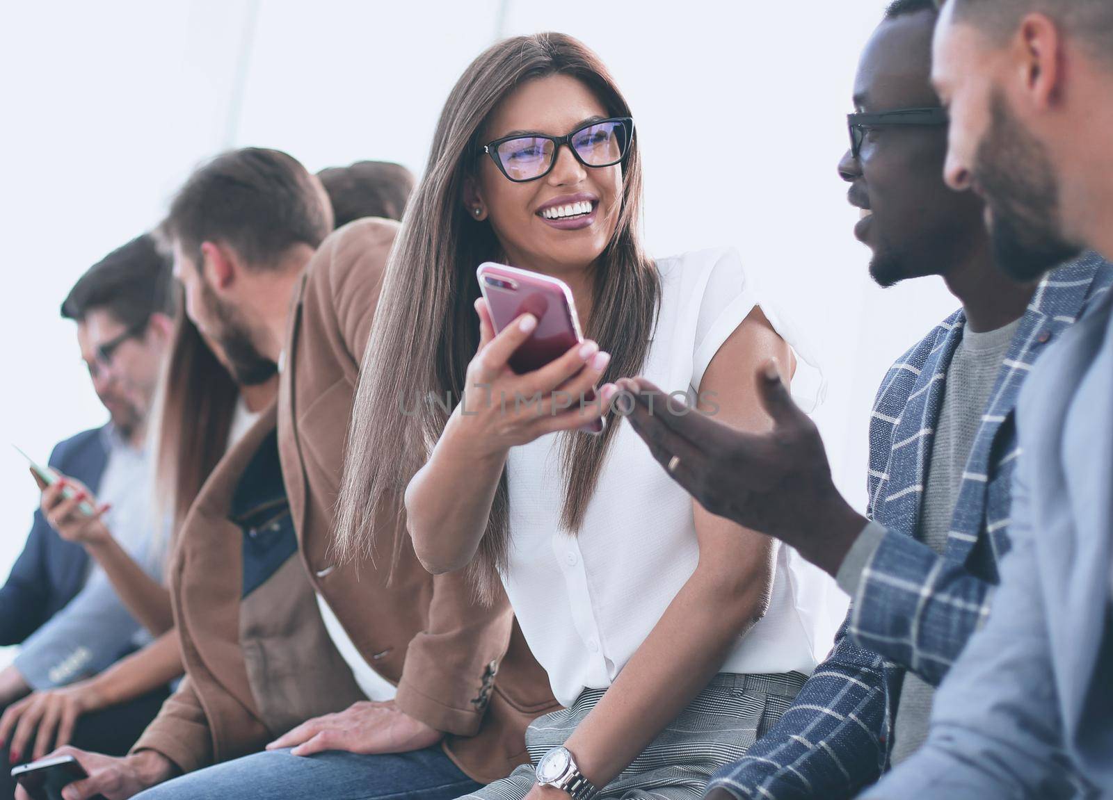 group of young people with smartphones by asdf