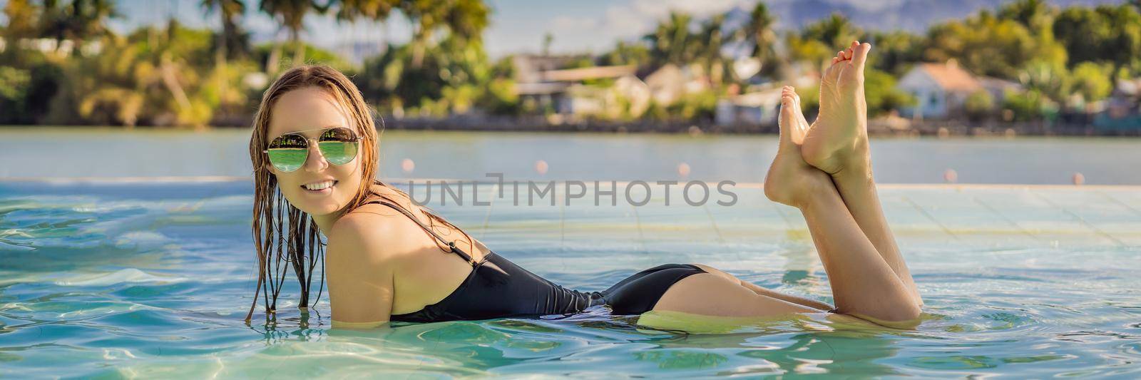 Luxury resort swimming pool. Beautiful woman tourist relaxing in holiday retreat on summer travel vacation. Bikini girl in sunbathing swimsuit enjoying ocean background. BANNER, LONG FORMAT