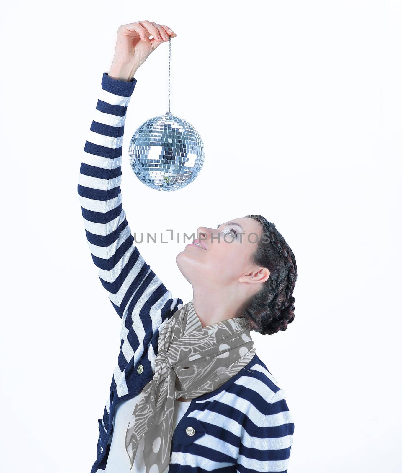 closeup.beautiful young woman holding a mirror ball .photo with copy space