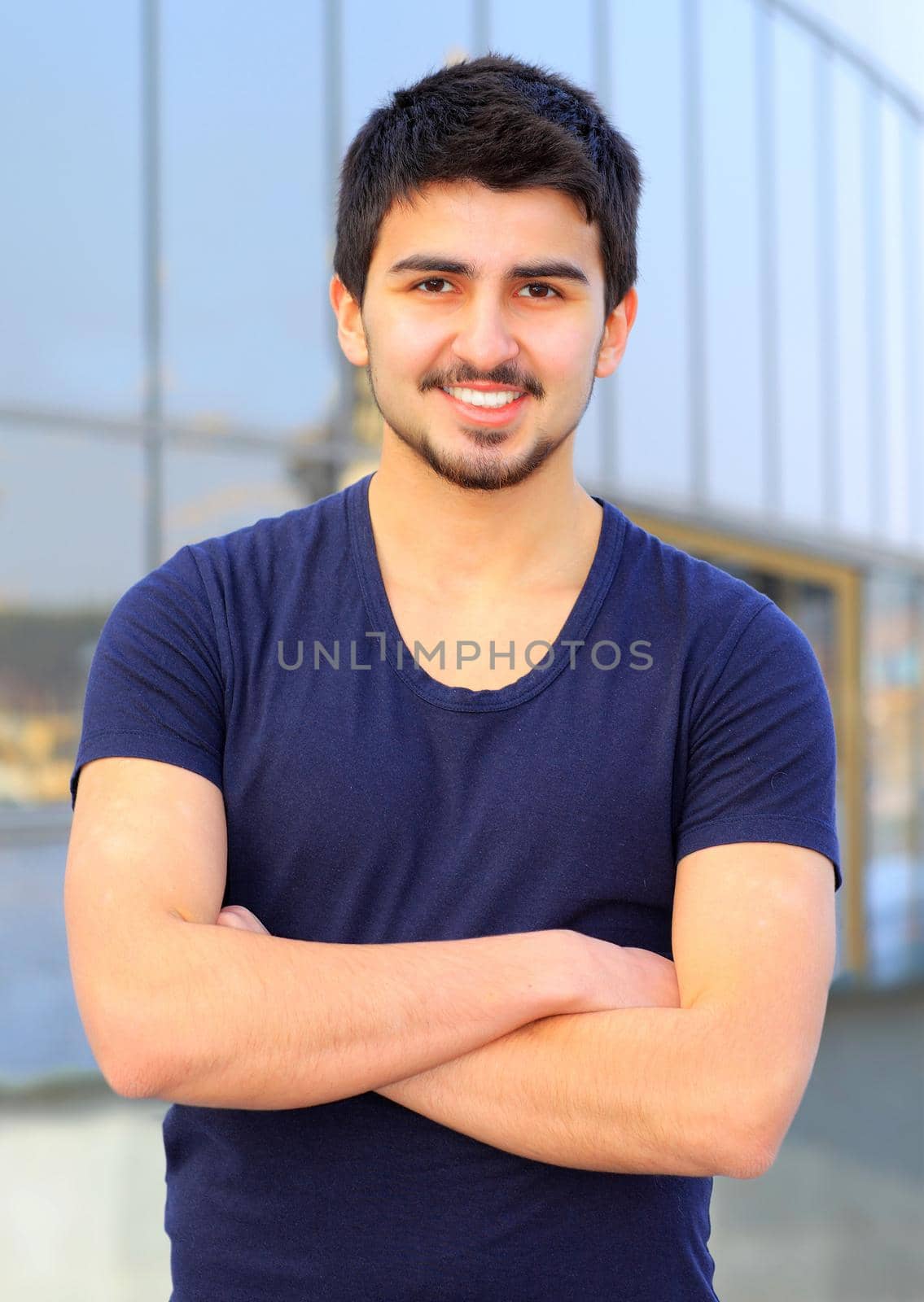 A handsome young man in plain clothes.