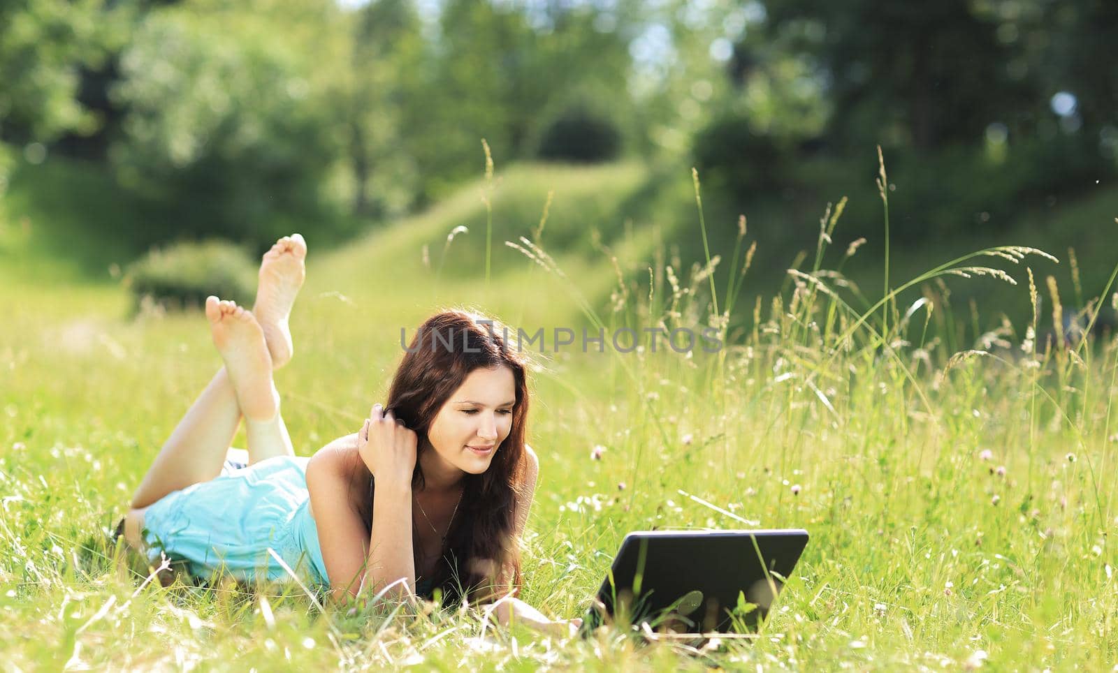 Beauty girl with laptop outdoors by SmartPhotoLab