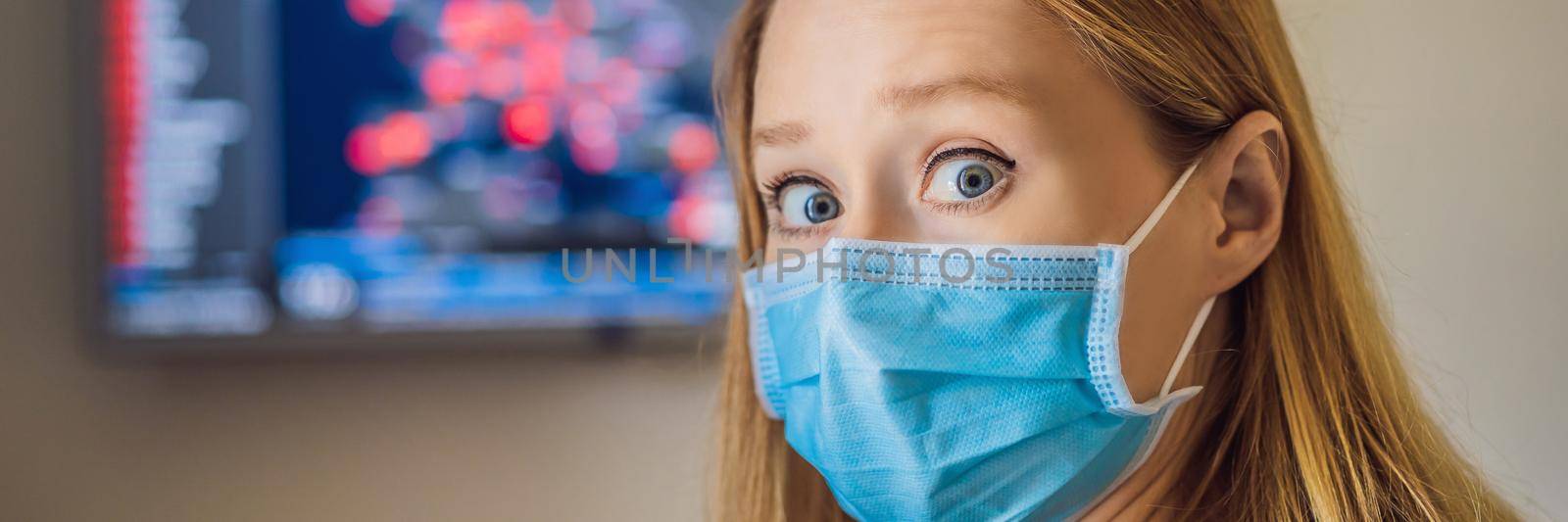 Young woman checks coronavirus sars-cov-2 covid-19 global cases situation online. Coronavirus outbreak in United States of America and World BANNER, LONG FORMAT by galitskaya