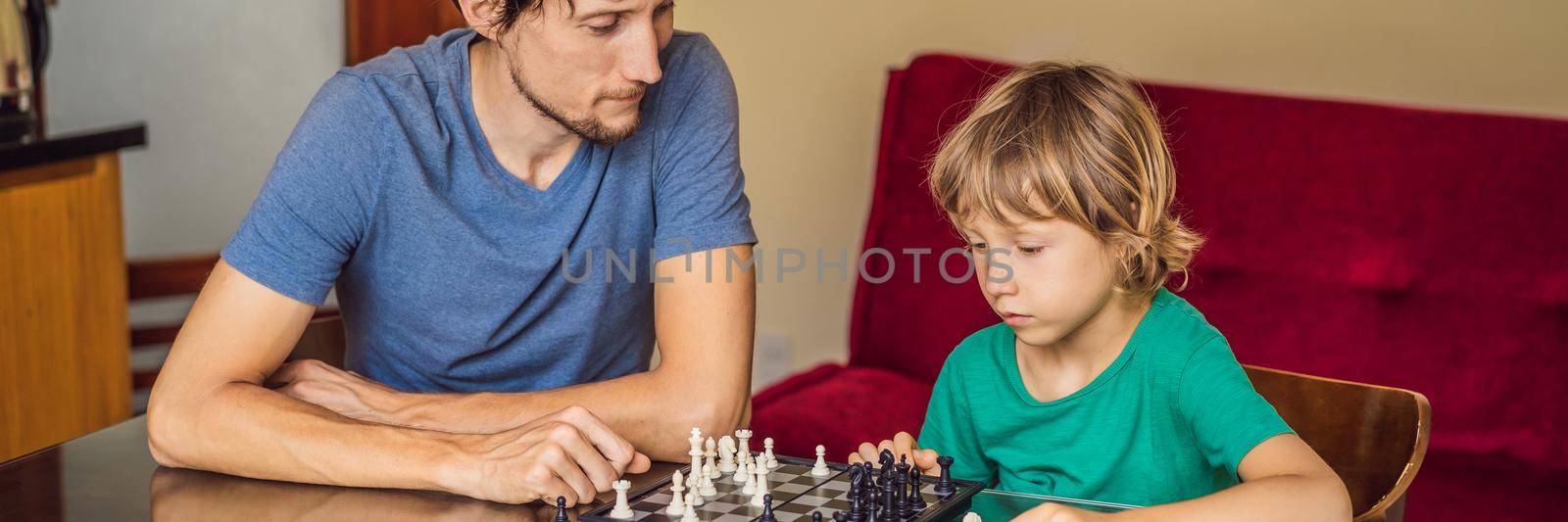 Happy Family Playing Board Game At Home BANNER, LONG FORMAT by galitskaya
