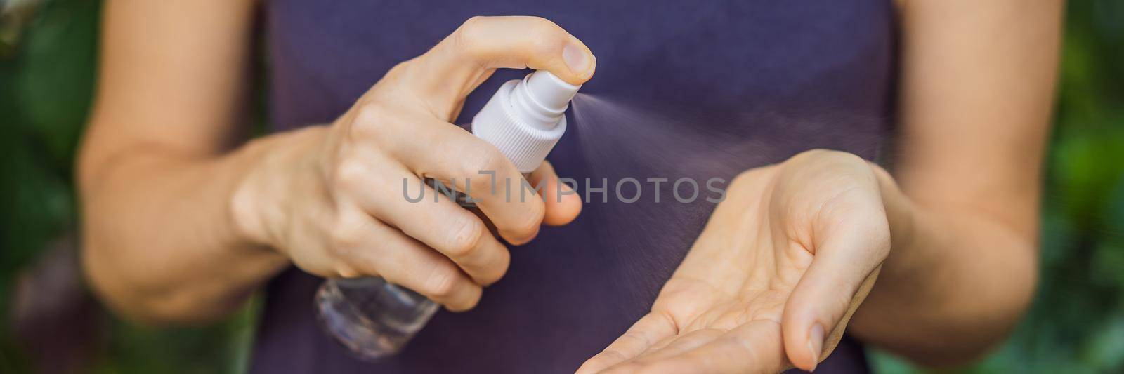 Women's hands using wash hand sanitizer gel BANNER, LONG FORMAT by galitskaya