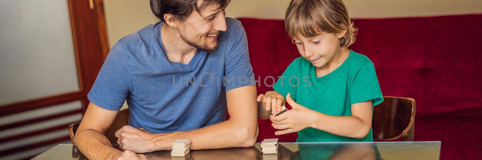 Happy Family Playing Board Game At Home. BANNER, LONG FORMAT