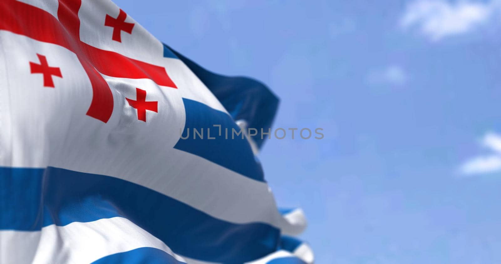 The flag of Adjara waving in the wind on a clear day. Adjara s a political-administrative region of Georgia