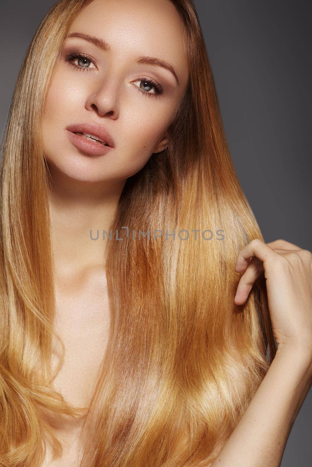 Fashion long hair. Beautiful blond girl,. Healthy straight shiny hair style. Beauty woman model. Smooth hairstyle by MarinaFrost