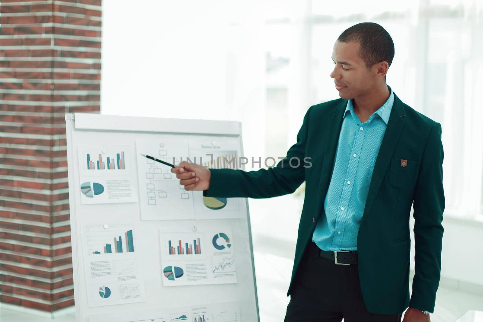 closeup.young businessman making presentation of a new financial project