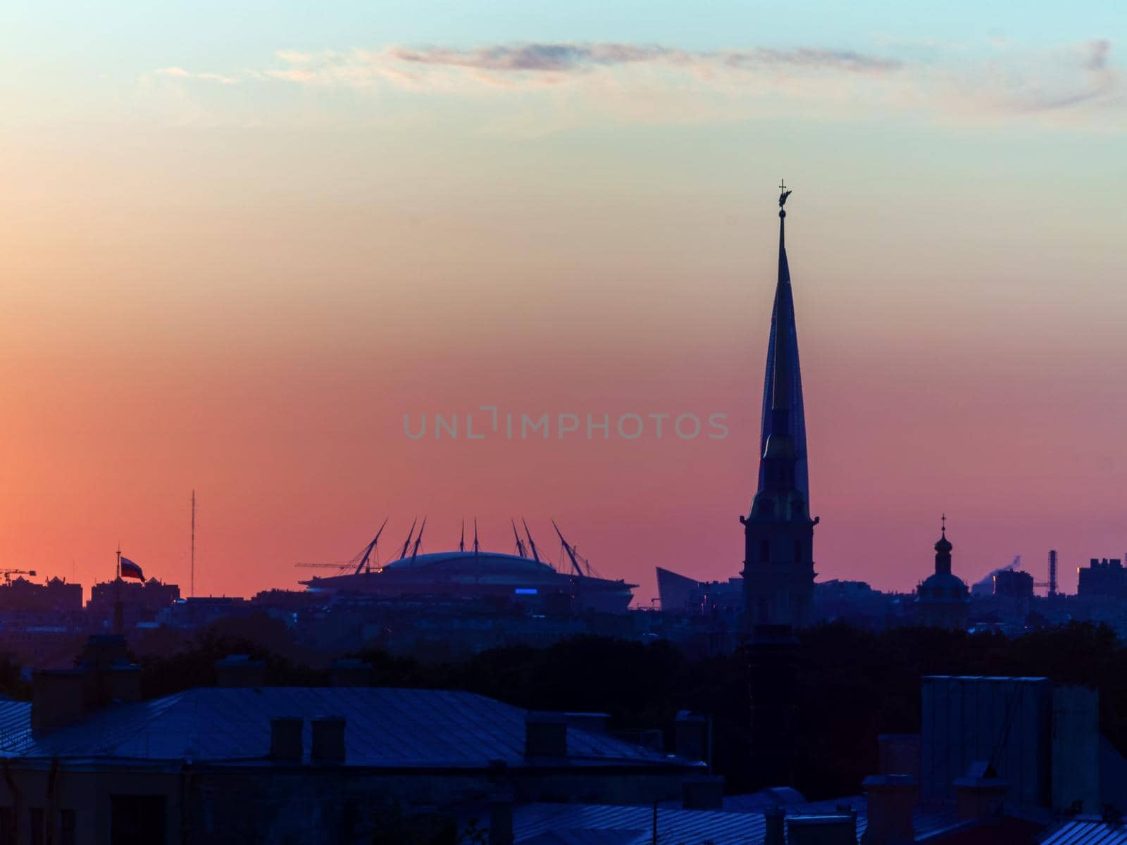 ST. PETERSBURG. RUSSIA - August 28, 2019. Krestovsky stadium, the Lakhta Center skyscraper and the Peter and Paul Fortress against a bright sunset sky by Andre1ns