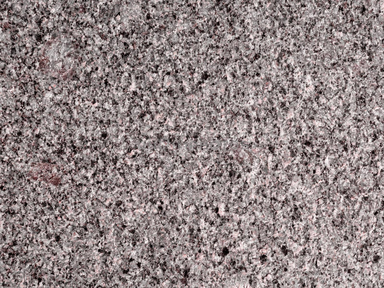 Granite granular texture with stains texture, granite surface and background.