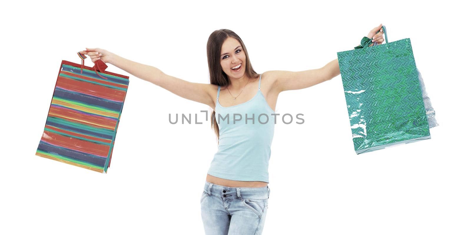 lovely woman with shopping bags over white.