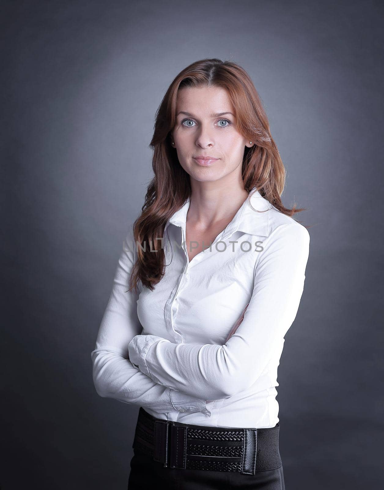 portrait of confident business woman .isolated on dark background.photo with copy space