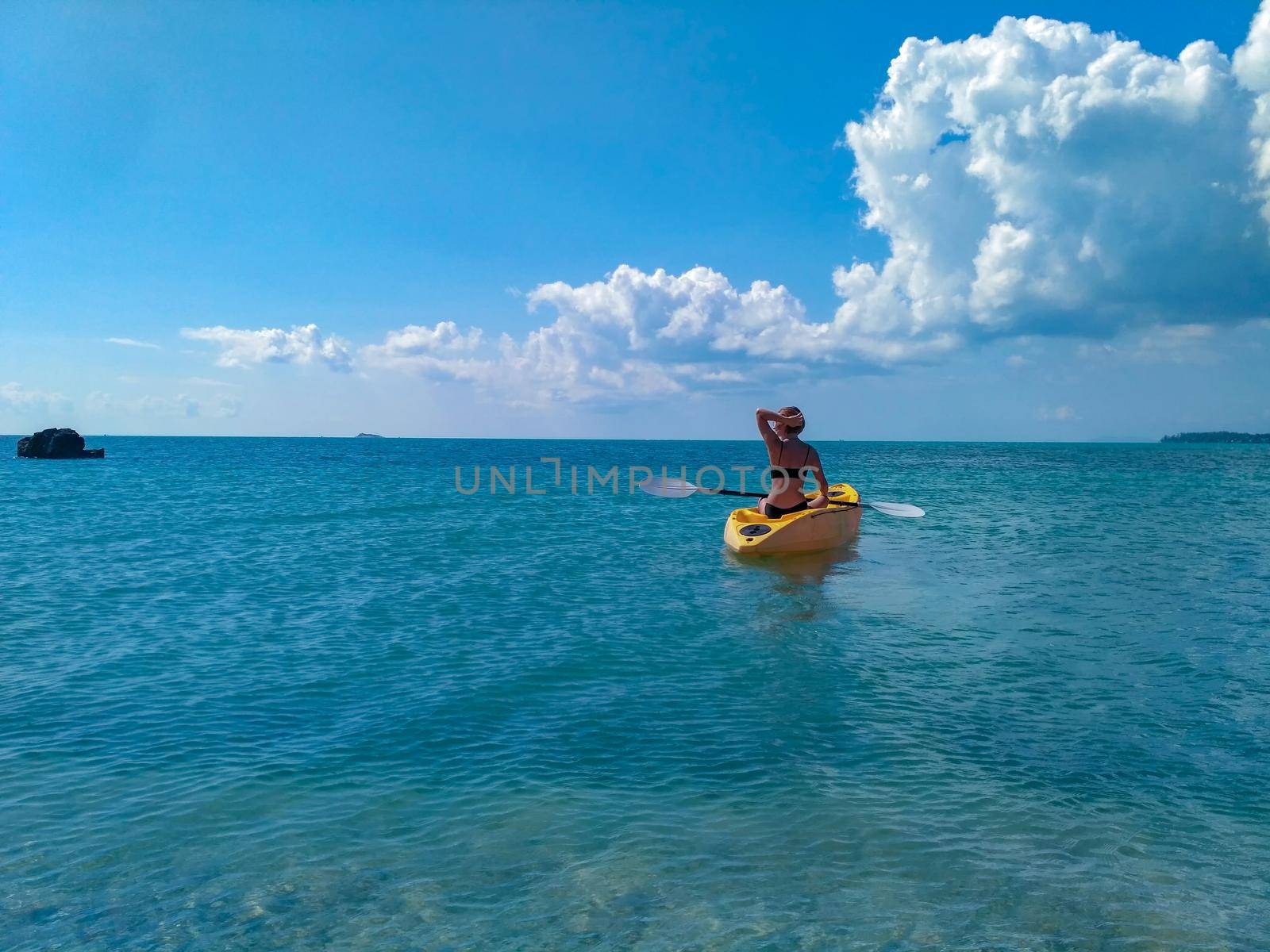 Brunette girl kayaking through lover's key kayak trail by Andre1ns