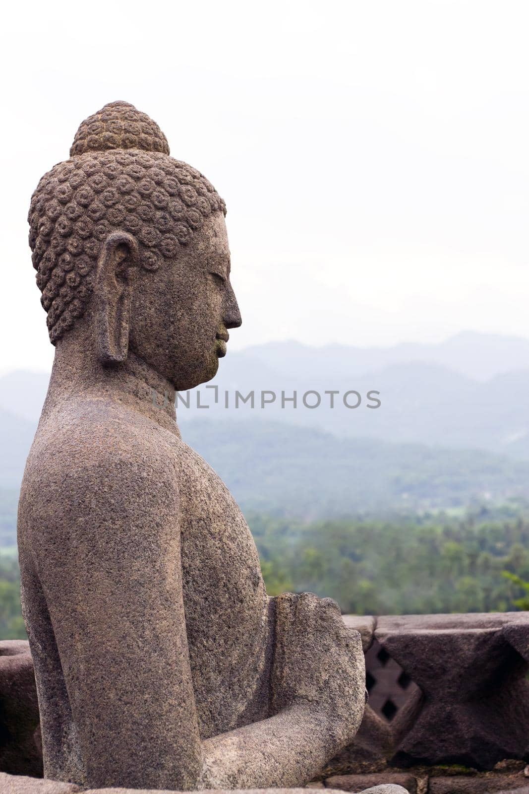 Buddha statue at Borobudur Temple. Yogyakarta, Central Java, Indonesia.