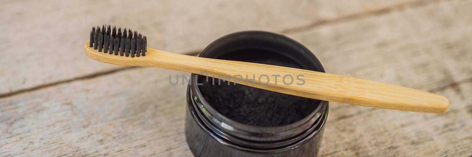Activated charcoal powder for brushing and whitening teeth. Bamboo eco brush BANNER, LONG FORMAT by galitskaya