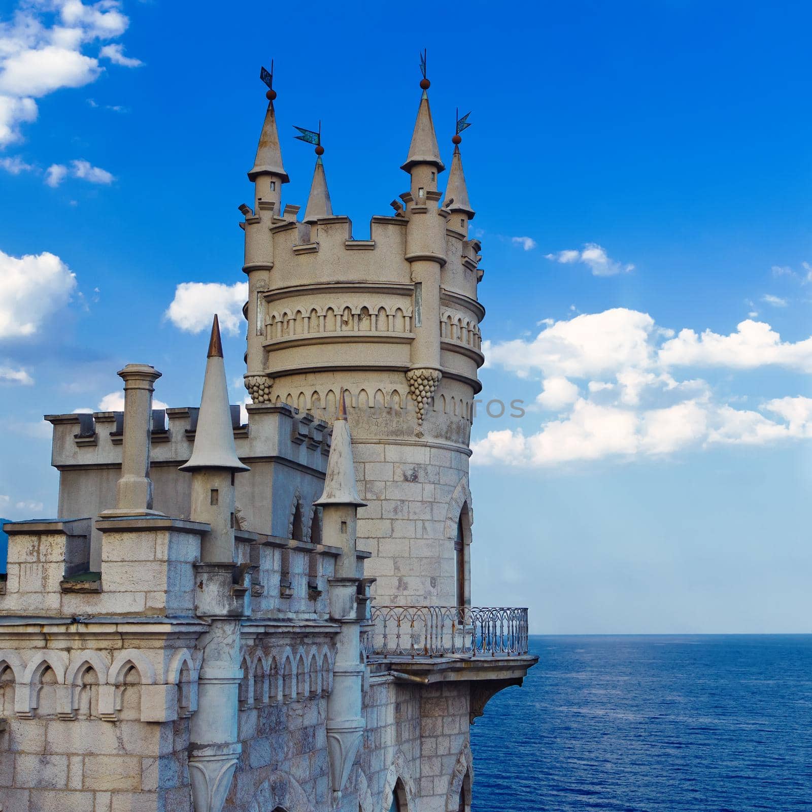 Medieval castle agains blue sky with clouds. Swallow's Nest, The Crimean Peninsula, Ukraine.