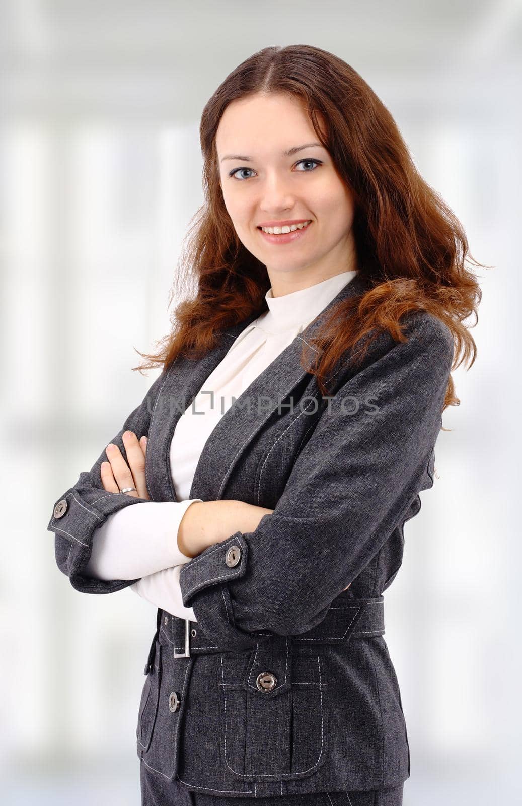 The beautiful business woman at office