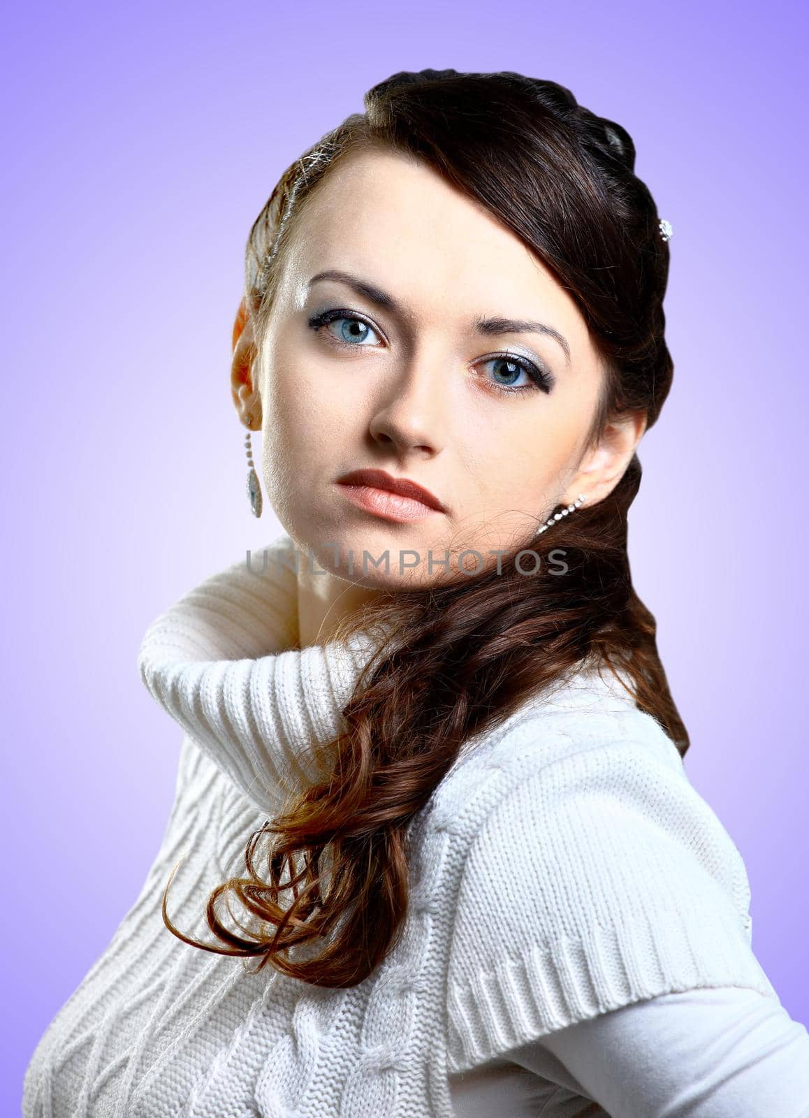 Beautiful girl in sweater. Isolated on a purple background. by SmartPhotoLab