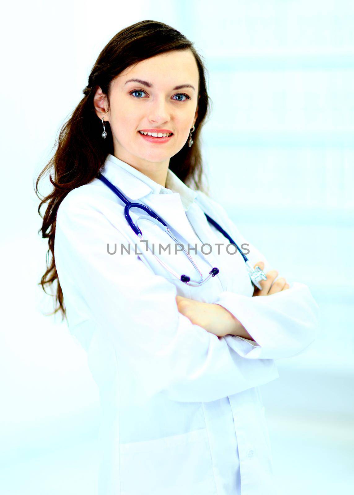 A young attractive woman doctor in the clinic.