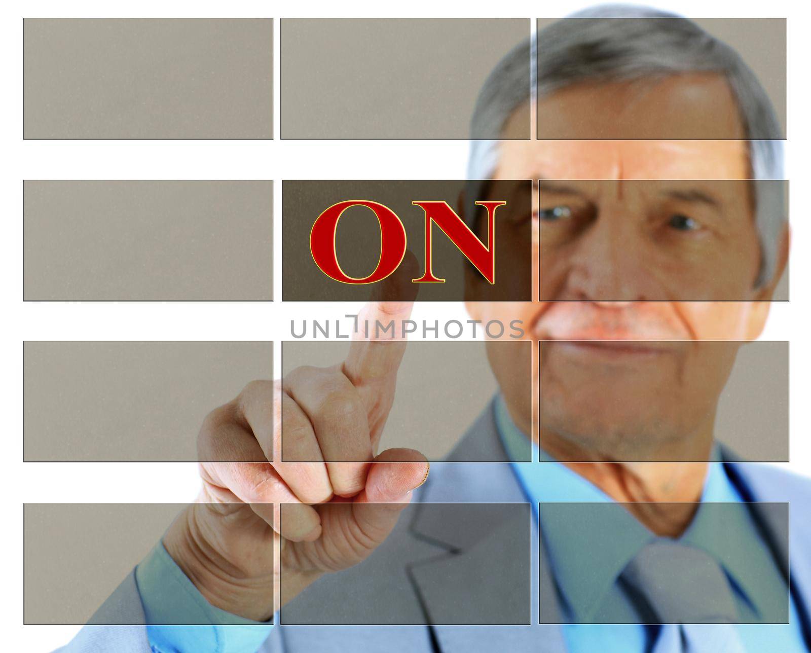Businessman in age, click on the button. Isolated on a white background.
