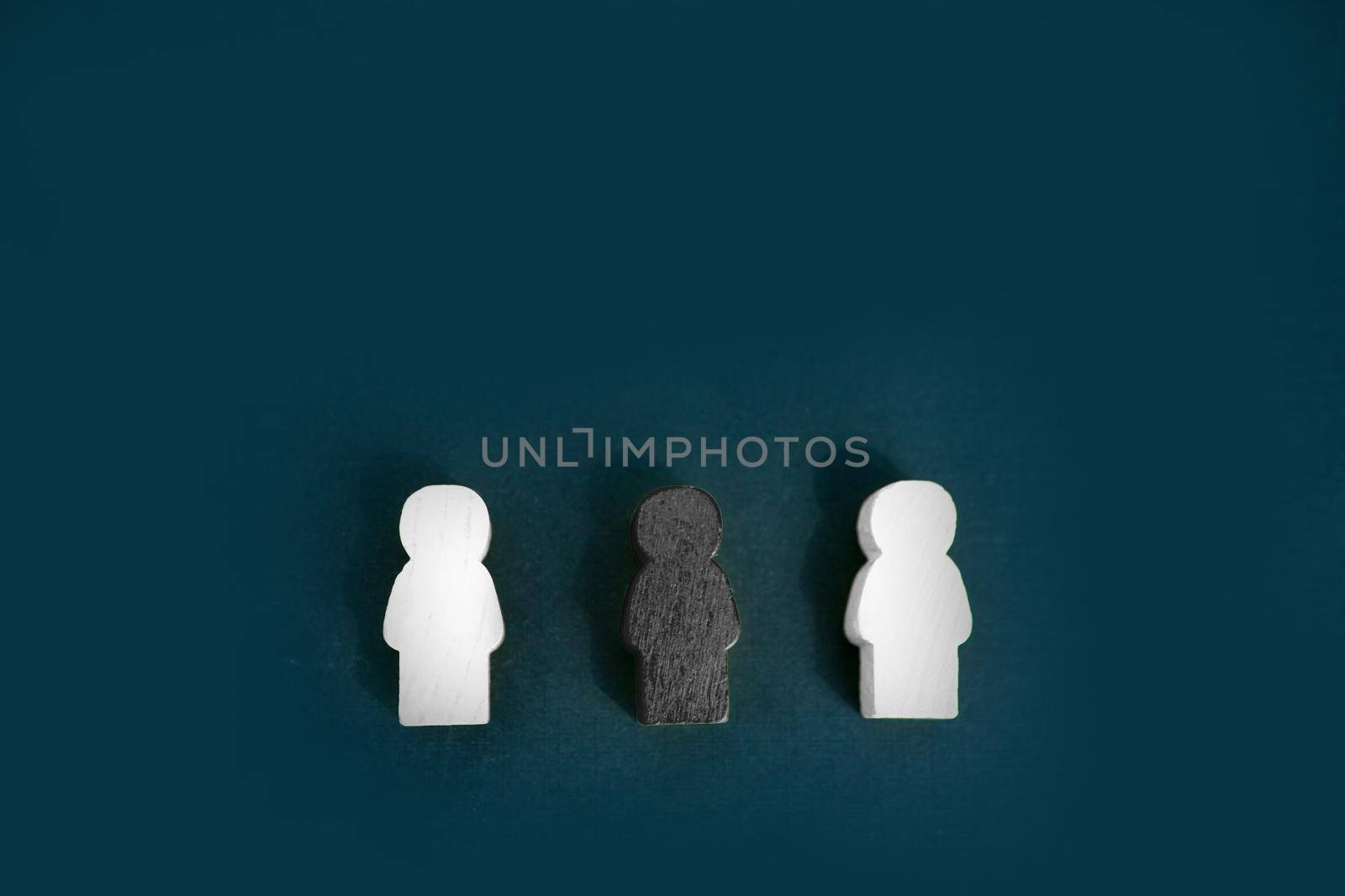 Black and white figures of people on a black background. The inscription in chalk-Stop racism. Black lives matter Motivational poster against racism and discrimination. by Annu1tochka