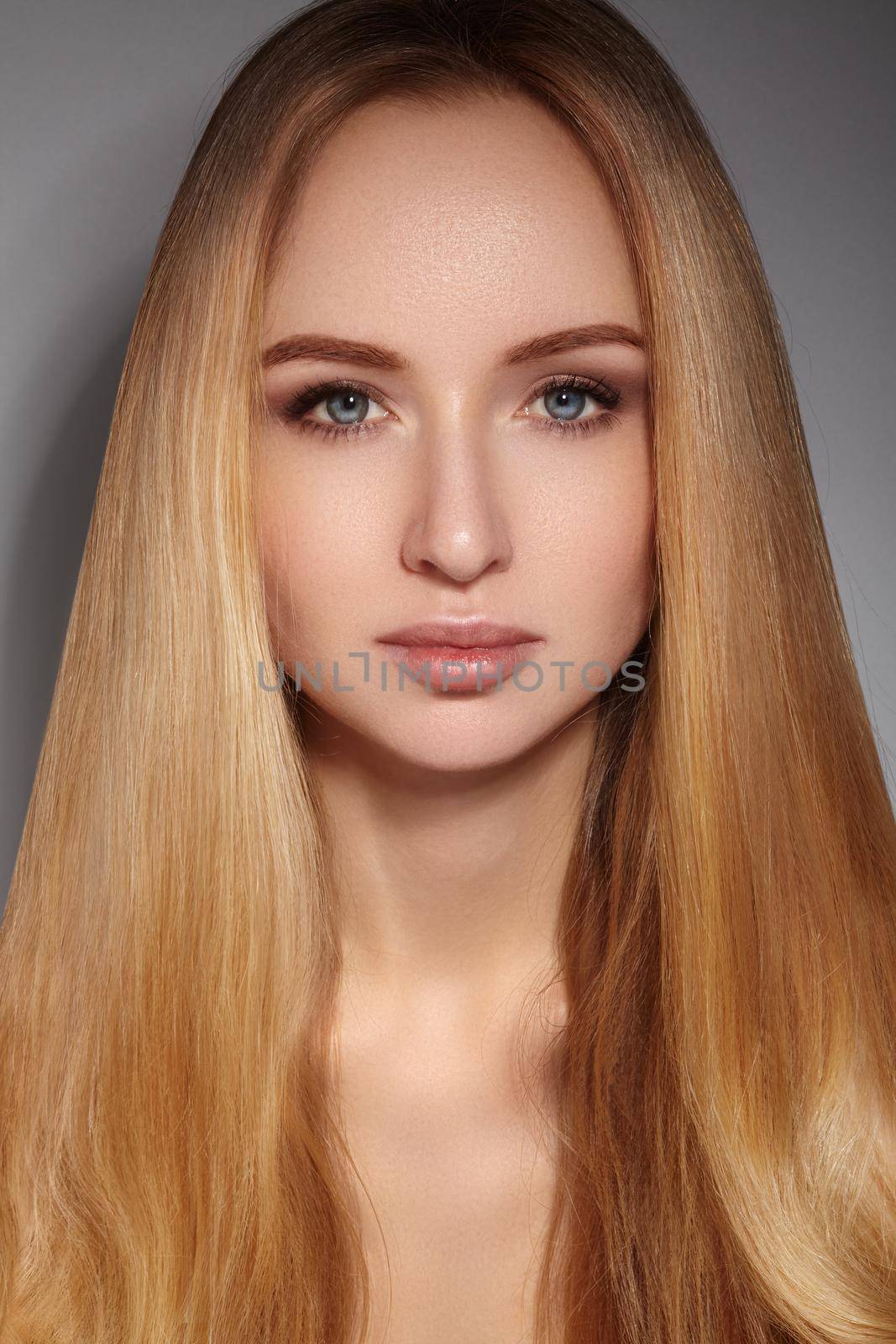 Fashion long hair. Beautiful blond girl. Healthy straight shiny hair style. Beauty woman model. Smooth hairstyle by MarinaFrost