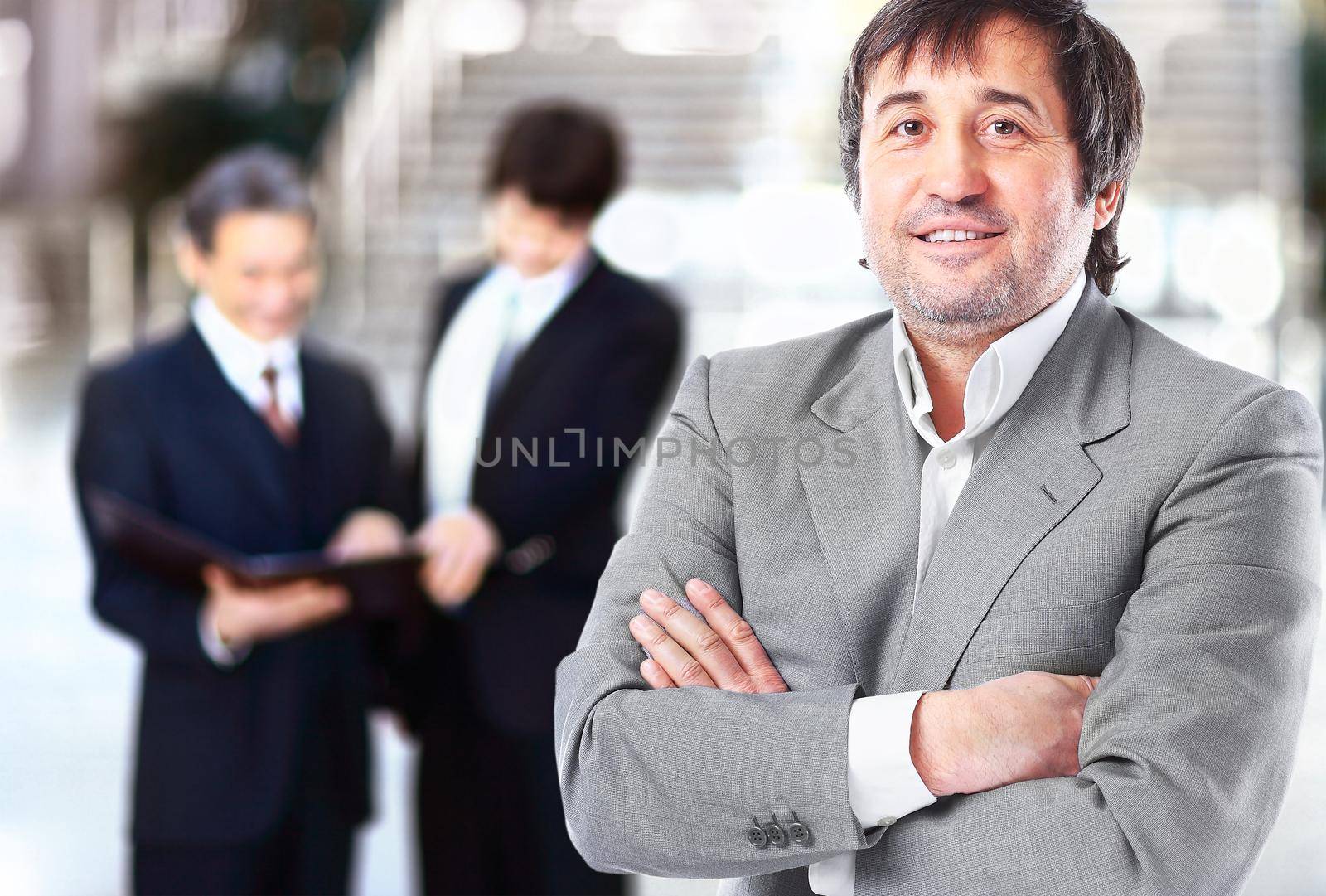 Portrait of a smiling handsome businessman