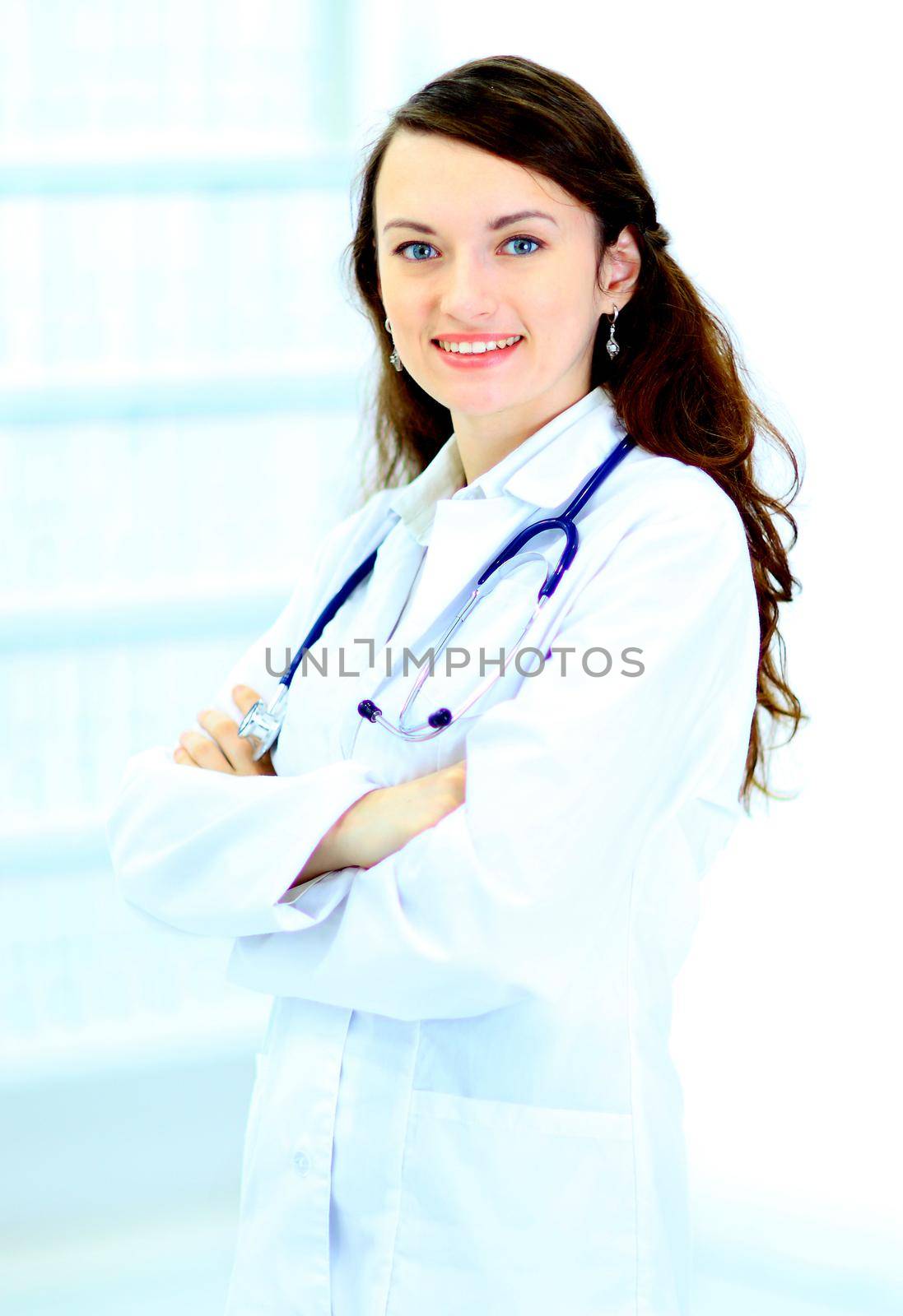 A young attractive woman doctor in the clinic.