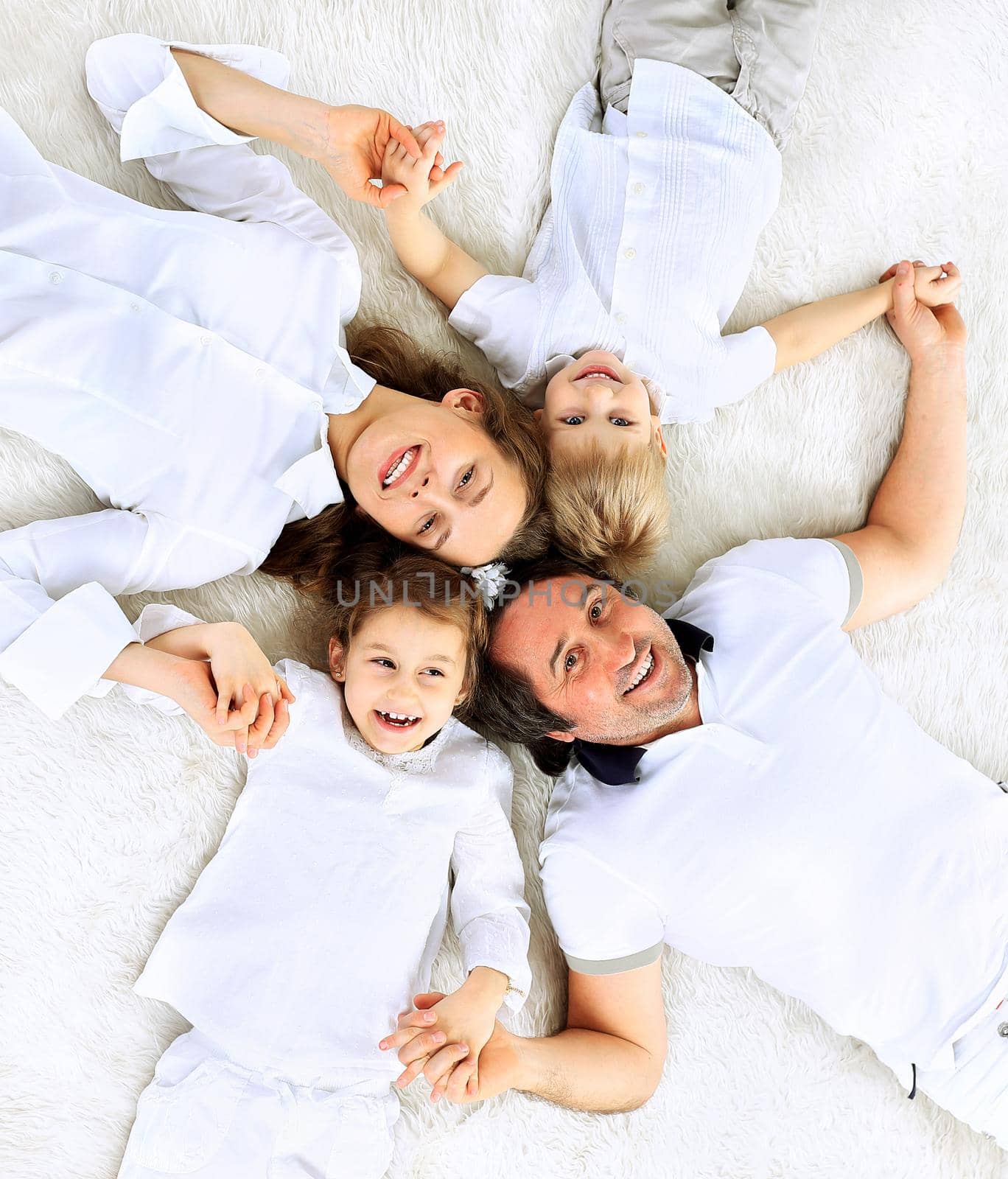 Beautiful happy family - isolated over a white background