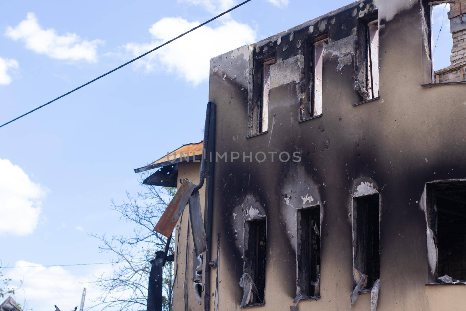 War in Ukraine. abandoned home. russian troops bombing peaceful city. War refugees in Ukraine. destroyed and burned apartment building. irpin 2022. Russian invasion. bomb and missile attack.