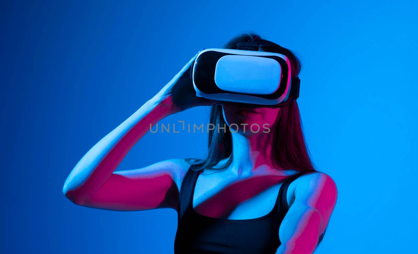 Woman with glasses of virtual reality. Future technology concept. by vovsht