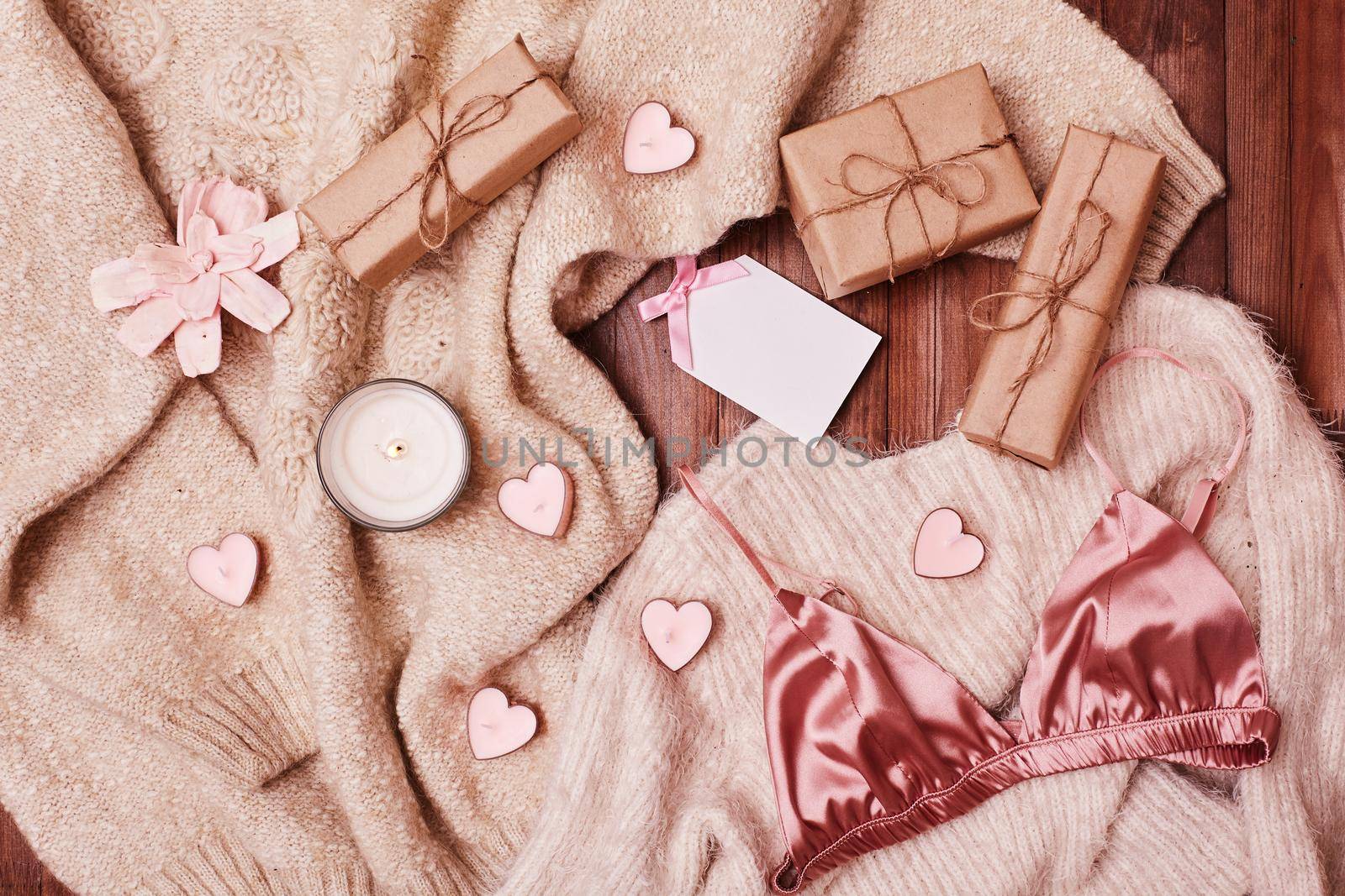 Cozy Winter Flatlay with Heart Candles, Gifts and Warm Knitted Plaid. Pink Still life for St. Valentines Day, Womans Day by MarinaFrost